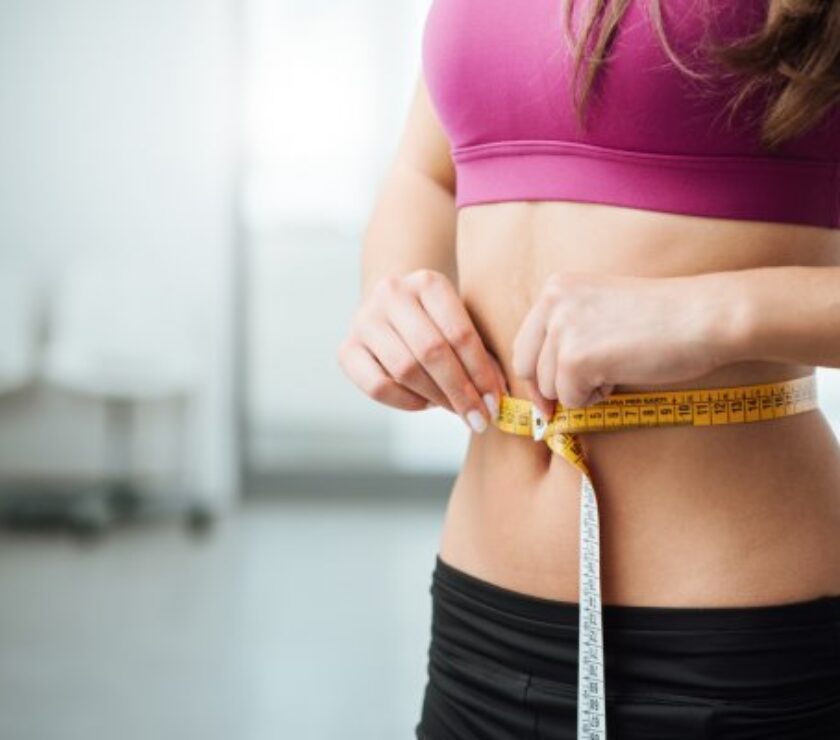 depositphotos_80139016-stock-photo-slim-woman-measuring-her-thin